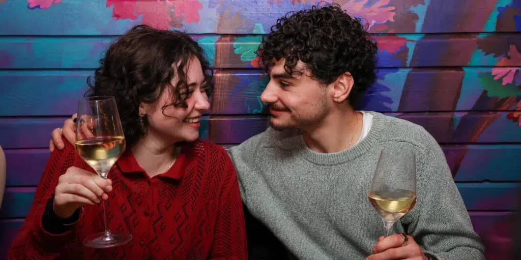 Couple enjoying wine on the Paris food tour